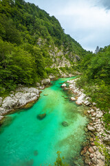 Soca Valley, Slovenia - River Soca is a beautiful turquoise water river in the Slovenian Alps located near the town of Kobarid in Triglav National Park, Julian Alps, Europe