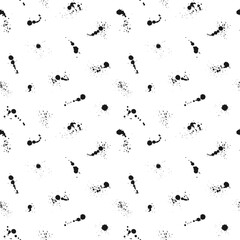 Seamless vector pattern of ink drops, stains and splashes. Abstract black and white splatter texture. Contrast grunge print for textiles, paper, wallpaper, advertising, fabric, interior decor.