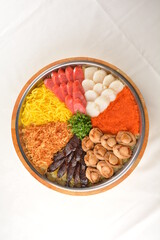 cny colourful treasure pot set with rice, meat and seafood with abalone, scallop, sausage, egg, vegetable, pork, prawn, duck, chicken floss, waxed meat in big platter sushi bento takeaway banquet
