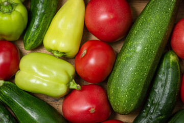 Vegetables on a wooden background. Ripe natural vegetables. Healthy diet. Vegetables close-up