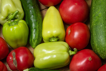 Vegetables on a wooden background. Ripe natural vegetables. Healthy diet. Vegetables close-up