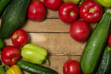 Vegetables on a wooden background. Ripe natural vegetables. Healthy diet. Vegetables close-up