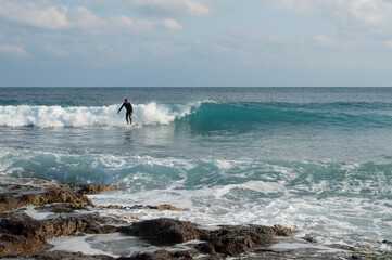 Surfing on Mediterranean Sea. Salento, Italy