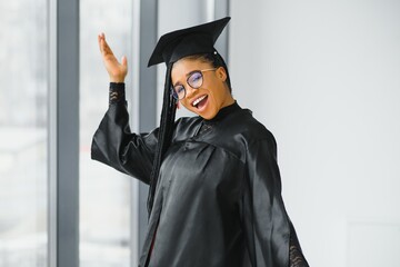 A pretty african american woman graduate