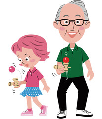 おじいちゃんと孫（孫娘）がけん玉をしています