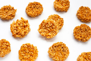 Rice cracker with coconut palm sugar on white