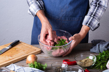 Raw beef and pork cutlets preparation at home