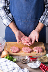 Raw beef and pork cutlets preparation at home