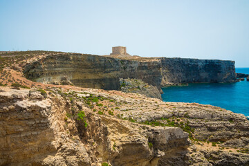 Fototapeta na wymiar Blue Lagoon, Malta. Comino Islands From Above Drone Photography Blue Lagoon. Aerial drone video of Blue lagoon Gozo Malta Comino island. Best beaches of Mediterranean Europe.