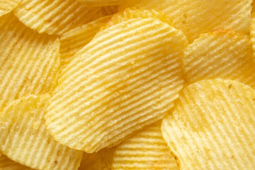 crispy golden potato chips snack texture background