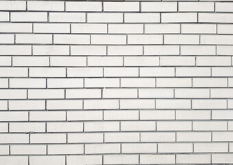 The background is made of a brick wall. Brick wall texture