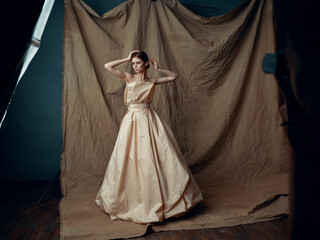beautiful woman in dress photoshoot posing studio