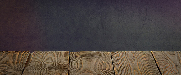 The background is blank wooden boards and a textured plastered wall with lighting and vignetting.