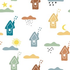 Obraz premium Cute houses and clouds in the boho style. Vector hand drawn baby collection for nursery decoration Cute seamless pattern for children's goods, fabrics, backgrounds, packaging, covers.
