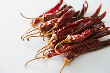 dried spicy red pepper on white background