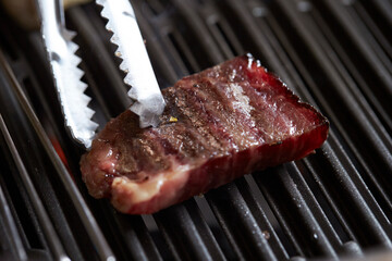 Grilled fresh raw beef on the grill