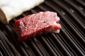 Grilled fresh raw beef on the grill
