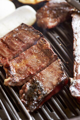 Grilled fresh raw beef on the grill