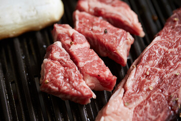 Grilled fresh raw beef on the grill