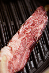 Grilled fresh raw beef on the grill
