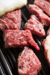 Grilled fresh raw beef on the grill