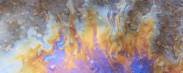 Fototapeta na wymiar multicolored spot gasoline abstract background, abstract oil spill on water