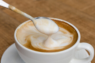 Latte coffee in white coffee cup