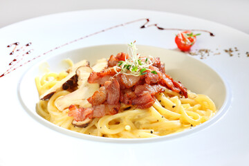 cook pasta noodle with carbonara aglio olio sauce and seafood, bacon, mushroom muscle octopus western halal menu