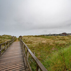 wooden bridge over the sandy links in Saint Andrews, Scotland