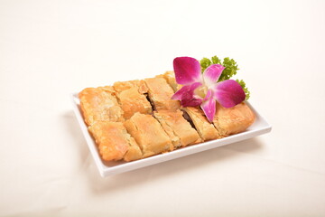 crispy deep fried red bean paste cake biscuit pie pastry with orchid flower asian dessert menu