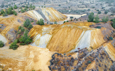 Colorful mine tailings and spoil heaps at abandoned copper mine near Kampia, Cyprus
