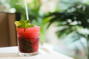 Refreshing red berry cocktail with fresh mint