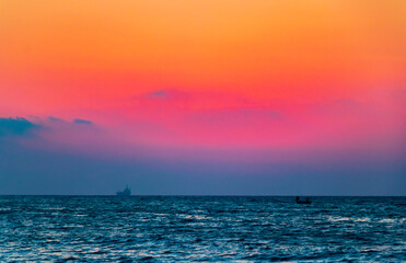 Fototapeta premium The most beautiful colorful sunset at Ialysos Beach Rhodes Greece.