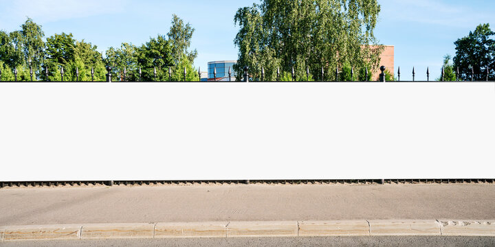 Advertising empty long white billboard with space for mockup information