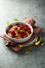 Traditional homemade raspberry crumble with fresh mint