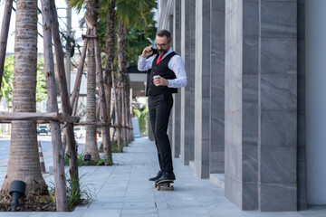 Lifestyle Professional Businessman Riding skateboard in City near Work space.