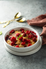 Traditional homemade raspberry crumble with fresh mint