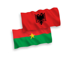 Flags of Burkina Faso and Albania on a white background