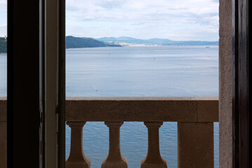 View on the gulf of Trieste, Italy, with the city's skyline in the background, from a balcony of the castle of Duino