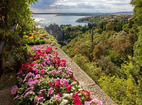 View from a flower decorated terrace of the castle of Duino on the coast toward Monfalcone