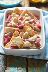 Raw rhubarb  ricotta bread and  butter pudding. Oven ready 