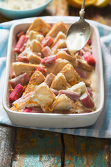 Raw rhubarb  ricotta bread and  butter pudding. Oven ready 
