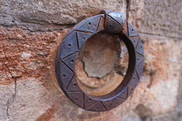 Old iron ring for tying up horse in Siena, Tuscany