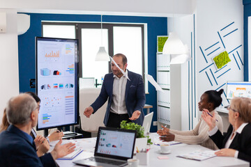 Nervous businessman quarrelling in coworking having conflict at workplace blaming accuses for bad work incompetence mistakes. Reprimanding unsuccessful results and rivalry concept.