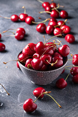 Plate of juicy fresh ripe cherries close up
