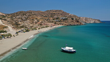 Obraz premium Aerial drone photo of paradise sandy beach of Agia Kiriaki with emerald clear sea in South Milos island, Cyclades, Greece