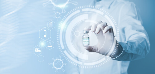 Medicine doctor with Covid-19 Vaccine in hand. Medical and Medicine for Coronavirus