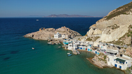 Fototapeta na wymiar Aerial drone photo of famous traditional fisherman settlement of Firopotamos with colourful boat houses called sirmata, Milos island, Cyclades, Greece