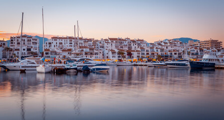Luxury marina in Puerto Banus, Marbella at sunset. - obrazy, fototapety, plakaty