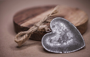 Metal heart with wooden coaster